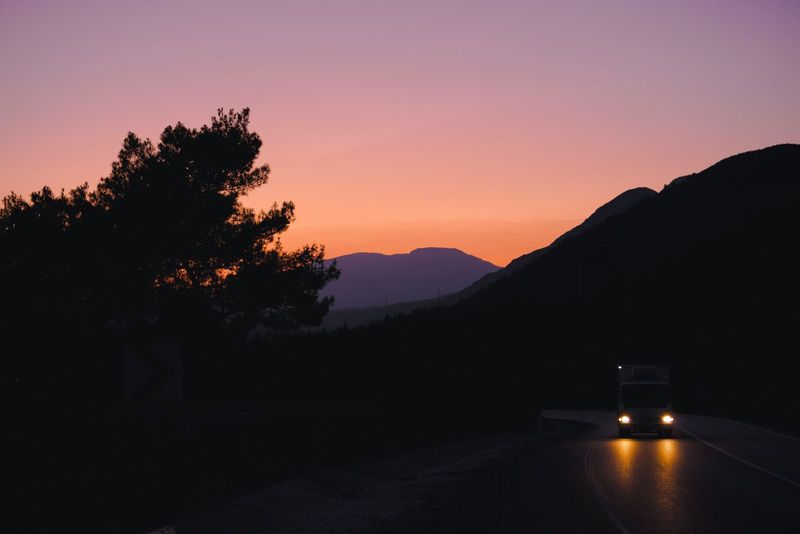 Truck on a highway at dusk